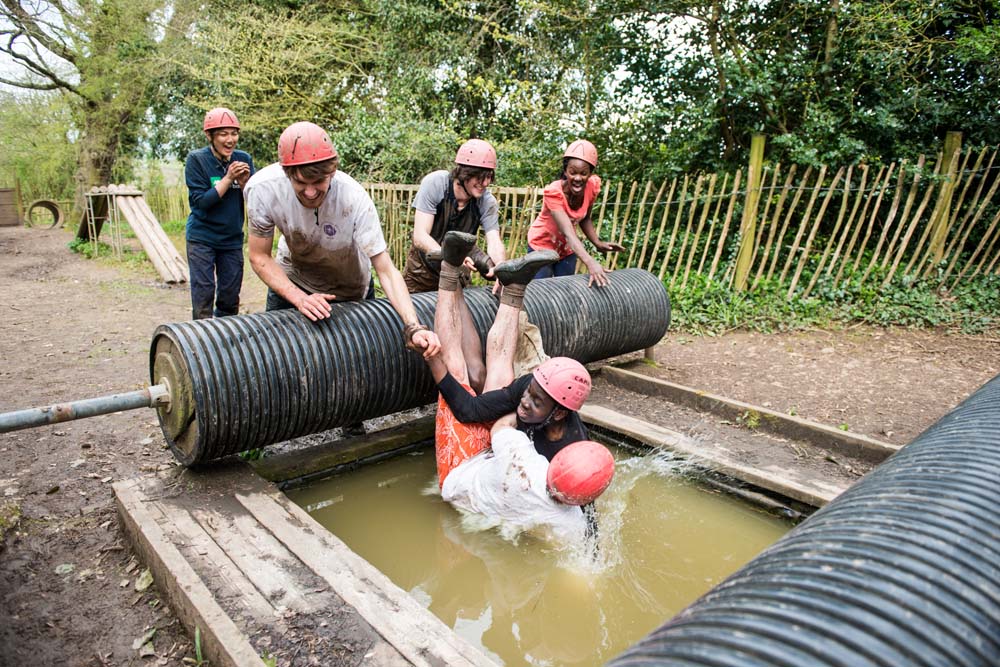 Explorers tackling an obstacle course