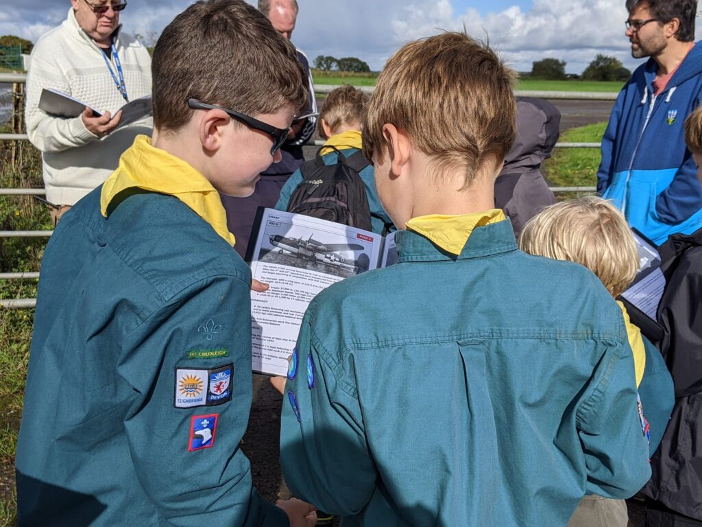 1st Chudleigh Scouts studying aircraft